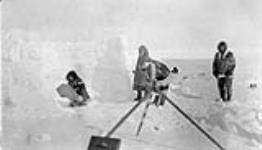 Rehearsing a scene for the "Dance of the Copper Eskimos" April 1931.