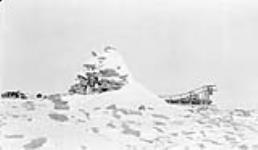 Ancient Inuit structure on top of Tikerak hill April 1931.