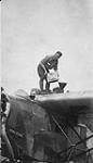 Roy Brown [refuelling a Fokker 'Universal' Aircraft] Cranberry Portage, [Man.], 1928 1928