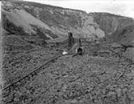 Elevator No.1 of the Yukon Gold Company in operation in pit at Claim 29 Below Bonanza 1910