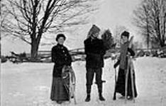 [Unidentified trio snowshoeing near Metcalfe, Ont. Christmas, 1912.] 1912