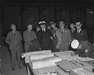 Group of newspaper editors touring H.M.C.S. "Stadacona" 30 Aug. 1941