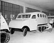 [A completed Snowmobile at the Bombardier Co. Factory [Valcourt, P.Q.]] Nov. 1953