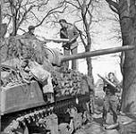 Sherman tanks of Headquarters Squadron, The British Columbia Regiment, shelling a German position near Meppen, Germany, 8 April 1945 April 8, 1945.