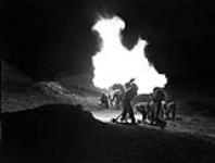 Mortars of the 1st Canadian Corps firing at night, Italy, 6 April 1944 April 6, 1944.