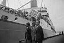 Japanese Canadians being sent to Japan after war on U.S. Army transport  S.S. GENERAL M.C. MEIGS at C.P.R. Pier A 16 June 1946
