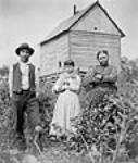 S. L'Africain, Hudson Bay Company Agent, with wife and daughter, Bay Lake/Employé de la Compagnie de la baie d'Hudson à Bay Lake (Ont.) avec sa femme et sa fille 21 August 1896