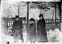 Bessie Taylor, Adam and Lillie Ballantyne on snowshoes [October] 1890.