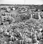 Lobster pots and markers on shore of fishing village of Yarmouth, Nova Scotia Sept. 1948