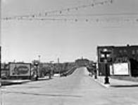 Central Avenue, looking south toward viaduct over railway tracks Oct. 1949