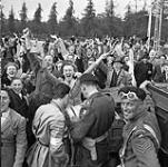 Dutch civilians and Canadian Army troops celebrating the Liberation 7 May 1945