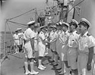 Admiral Sir Bruce Fraser, Commander-in-Chief of the British Pacific Fleet, meeting the officers of H.M.C.S. UGANDA, 20 March 1945 Marh 20, 1945.