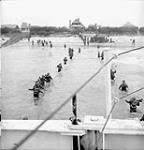 Infantrymen of The North Nova Scotia Highlanders landing from LCI(L) 135 of the 2nd Canadian (262nd RN) Flotilla during Exercise FABIUS III, Bracklesham Bay, England, 4 May 1944 May 4, 1944.