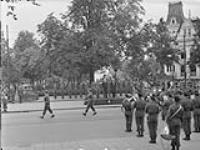 Troops of the 5 Canadian Armoured Division passing the saluting base during the march past. Groningen, Netherlands, 19 August, 1945 19 Aug. 1945
