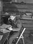 Captain Ronald Leathen of the 5th Field Regiment giving "Fire" order on the phone 1 - 2 Feb. 1945