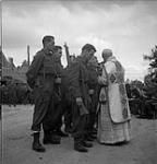 French-Canadian personnel taking part in a Mass celebrating Bastille Day 13-Jul-44