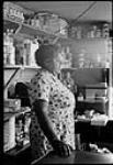 Africville - Black community - unidentified woman in grocery store [Matilda Newman]. 14 Sept. 1965