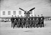 Personnel with a Hawker Hurricane XII aircraft of No.130(F) Squadron, R.C.A.F. Station Bagotville, Québec, Canada, 21 October 1942 October 21, 1942