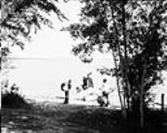 Loading canoe - Prince Albert National Park Aug. 1935