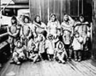 Inuit women and children on a ship, Erik Cove, Quebec, [Nunavut], 1904 1904.