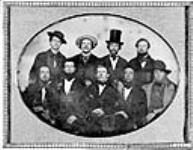 Group of merchants from Yarmouth, N.S. Standing, left to right: Wm. Brown, Herman Crowell, Charles White, and Dave Burton; Seated: Samuel M. Ryerson, James Williamson, L.E. Baker, Writing Master Williams, and O.S. Davison at Mason Hall 1855