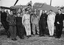 Pilots with Hawker 'Hurricane' aircraft of No.242 Squadron, R.A.F.. (L-R): Denis Crowley-Milling, Hugh Tamblyn, Stan Turner, (Saville (on wing), Neil Campbell, Willie McKnight, Douglas Bader, Eric Ball, Homer, Ben Brown 1940