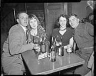 Interior view of two couples at the Standish Hotel [ca. 1950]