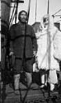 Nuqallaq, one of three Inuit charged with murdering Robert S. Janes, with Mrs. Gertrude Craig August 1923