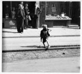 Amsterdam, boy caught stealing wooden blocks March 1945.