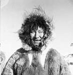 Inuk man in a caribou parka at Cambridge Bay (Iqaluktuuttiaq) 1950