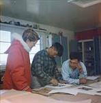 [Barbara Hinds with printmakers Lukta Qiatsuk and Iyola Kingwatsiuk] [between August 24-October 3, 1960].