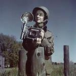 Sgt. Karen Hermiston, CWAC, with Speed Graphic Camera from WWII ca. 1943-1965.