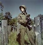 Sgt. Karen Hermiston, CWAC, with Speed Graphic Camera from WWII ca. 1943-1965.