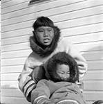[Two children wearing parkas] [between 1956-1960]