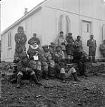 [Group outside of an Anglican Church, Kinngait, Nunavut] [between 1956-1960]