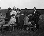 Caughnawaga [Kahnawake] reserve - near Montreal [left to right: Kahntineta Horn (nee Delishe), Joseph Assenaienton Horn, Peter Ronaiakarakete Horn (Sr), Peter Horn (Jr), Theresa Deer (nee Horn), Lilie Meloche (nee Horn), unknown, Andrew Horn, unknown] 1910.