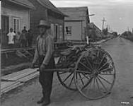 Tobacco peddlar with cart 1925