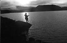 [Mackenzie Porter fishing off the coast, Iqaluit, Nunavut] 1960