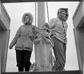 [Barbara Hinds (left) and Bob Green (right) on boat Peterhead, Iqaluit, Nunavut] 1960