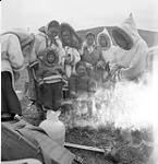 [Women and children standing outside, Kinngait, Nunavut] 1960