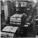 Globe and Mail, workers in the newspaper printing room, Toronto [ca. 1939-1951]
