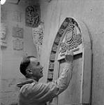 William Oosterhoff with sculpture [ca 1954-1963].