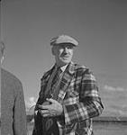 Highland Games, Antigonish, 1940, man wearing plaid jacket  août 1940