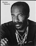 Press portrait of Richie Havens wearing several necklaces and rings [between 1969-1975].