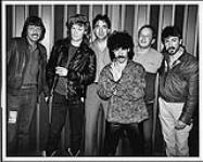 Hall and Oates meet with representatives of RCA following a show at the Forum in Montreal: (l to r) Ken Bain (RCA), Daryl Hall,  Nino Colavecchio (RCA), John Oates, Michel Turcot (RCA), Gilles Petelle (RCA) [ca 1984].