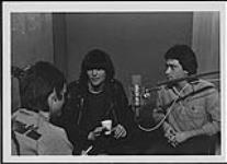 The Boomtown Rats duo during a live interview on CKRA-FM Edmonton with Peter Grainger [between 1977-1985].