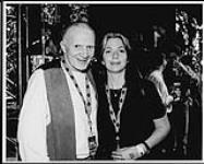 Walt Grealis and an unidentified woman, possibly at a MuchMusic location [between 1990-1995].