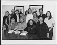 Duane Steele signing a record deal with Mercury/Polydor - (left to right, back row) Sara Milne (publicity), Cindy Zaplachinski (business affairs), Bill Ott (PGS), Bryan Potvin (A&R), Ruth Blakeley (Steele's manager), Donna listed (promotion), Russell Prowse (marketing), Samantha Miller (publicity), Ken Ashdown (promotion), Alanna Woods (business affairs), (front row) Doug Chappell (president), Duane Steele, Maureen Neville (business affairs), Livia Tortella (marketing) September, 1995