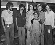 Group backstage at an Olympic benefit - (left to right) Graham Thorpe (Capitol), David Mazmanian, Sylvia Tyson, Clay Tyson (Sylvia's son), Paul White, Karen Ball [ca.1976].
