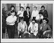 Tictoc at a party at Studio 306 to celebrate their contract signing - (left to right, front row) Tevan Kaplan, John Ford (VP/General Manager, RCA), Bernard Solomon (President, Dallcorte Records), John Defino, (back row) Tim Trombley (National Promotion/A&R Director, Dallcorte Records), Serge Porretta, Ron Chapman (Manager, Tictoc), Terry Brown (Producer), Ray Borg, Ken Bain (Ontario Promotion Rep, RCA) [between 1982-1983].